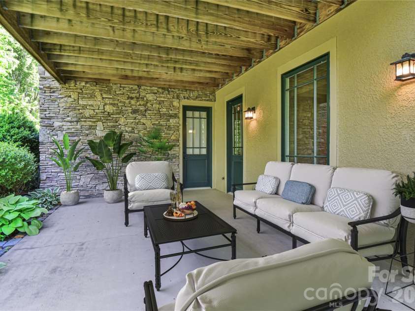 52 Mandolin Drive, Black Mountain, NC 28711.  MLS# CAR4377547, YatesRealty ID 19033. See the Possibilities with this Virtually Staged Patio Area