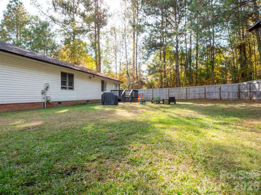 113 Tanager Drive, York, SC 29745.  MLS# CAR4320773, YatesRealty ID 1904. Fenced, Level Backyard with Shed and Deck