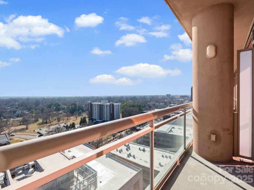 315 Arlington Avenue, Charlotte, NC 28203.  MLS# CAR4334361, YatesRealty ID 1904. Private balcony with long range views