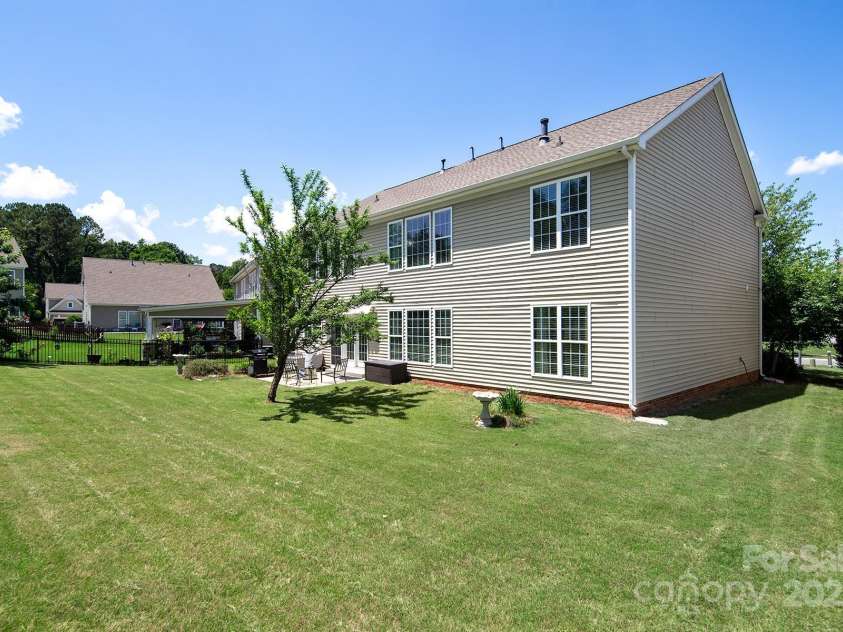 10792 Elsfield Avenue, Concord, NC 28027.  MLS# CAR4261572, YatesRealty ID 19040. Large private backyard