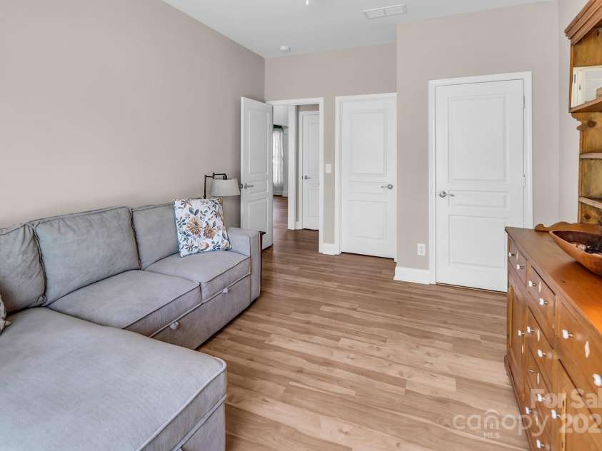 10792 Elsfield Avenue, Concord, NC 28027.  MLS# CAR4261572, YatesRealty ID 19040. Main floor bedroom with closet and door to full bathroom