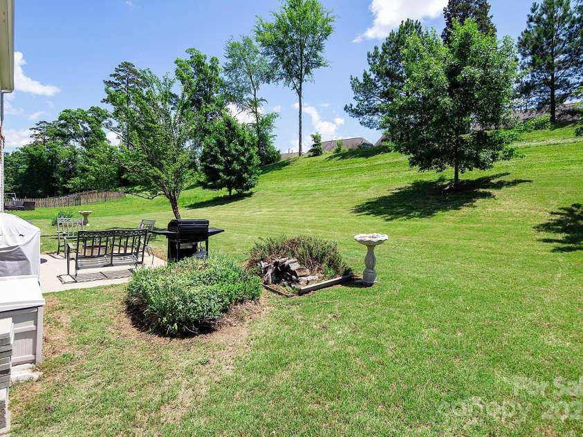 10792 Elsfield Avenue, Concord, NC 28027.  MLS# CAR4261572, YatesRealty ID 19040. Park-like setting!