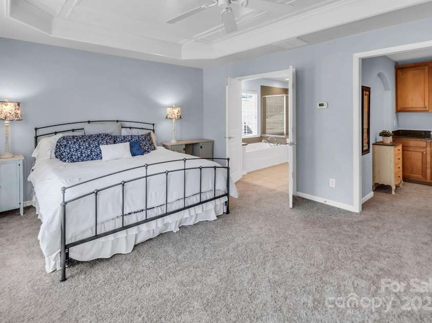 10792 Elsfield Avenue, Concord, NC 28027.  MLS# CAR4261572, YatesRealty ID 19040. Primary suite with entryway and cabinet nook inside the suite! Perfect for a coffee bar!