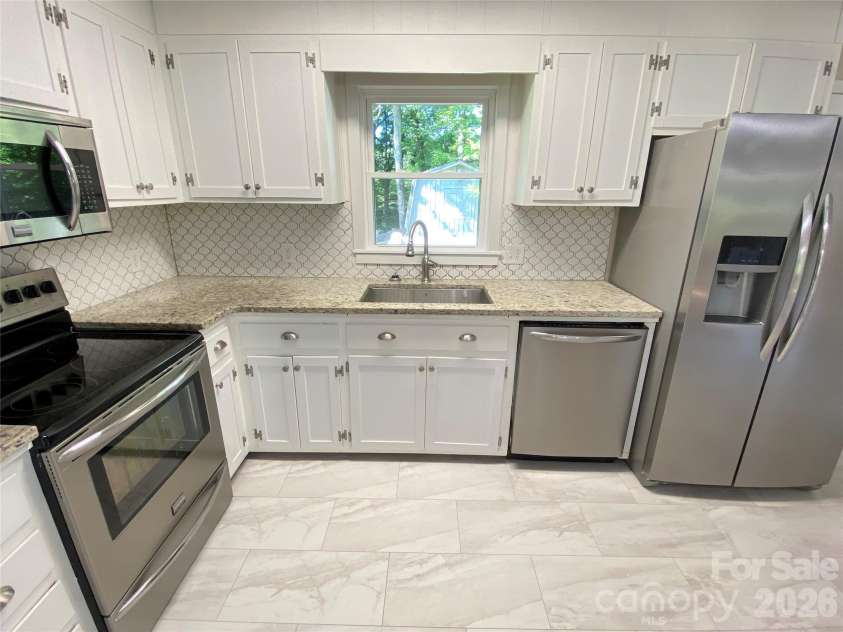 307 Maplewood Drive, Morganton, NC 28655.  MLS# CAR4377970, YatesRealty ID 19041. 