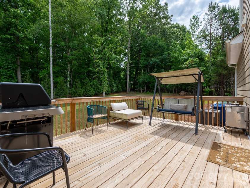 13025 Cinnamon Fern Lane, Charlotte, NC 28227.  MLS# CAR4261484, YatesRealty ID 19047. Backyard Deck