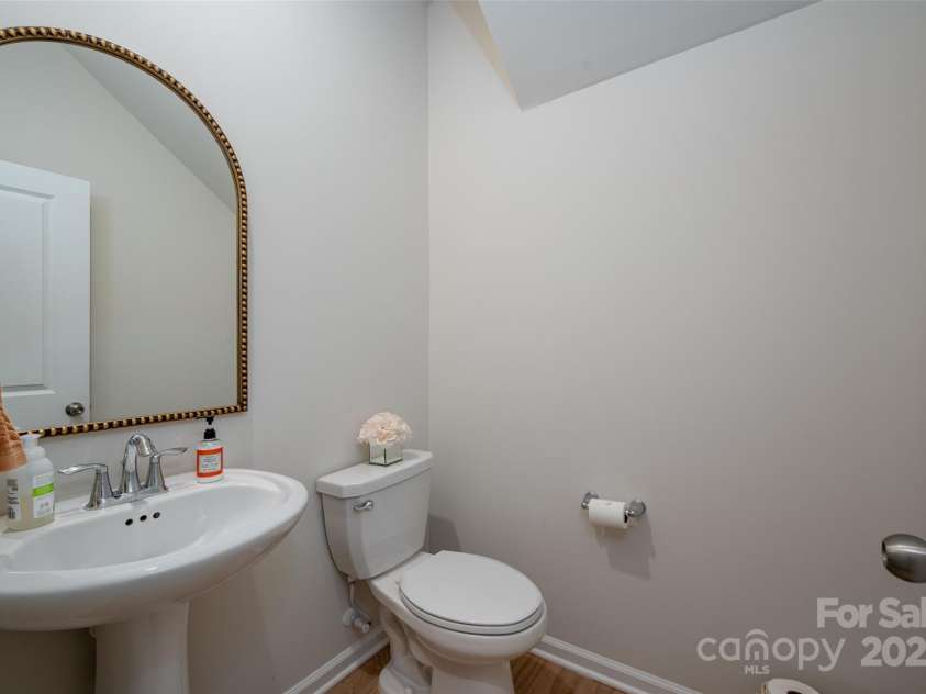13025 Cinnamon Fern Lane, Charlotte, NC 28227.  MLS# CAR4261484, YatesRealty ID 19047. Powder Room on Main
