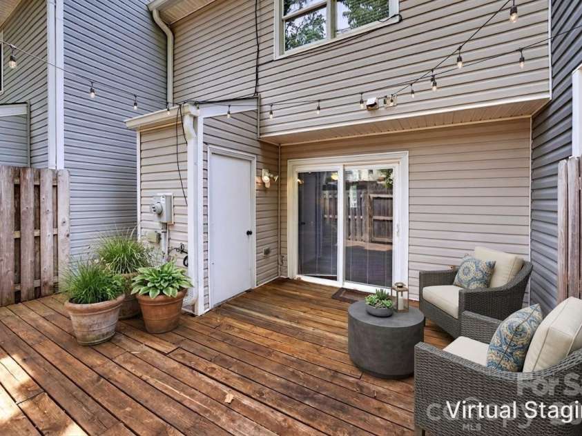 4321 Baylor Street, Greensboro, NC 27455.  MLS# CAR4378794, YatesRealty ID 19047. Virtually Staged (including string lights)