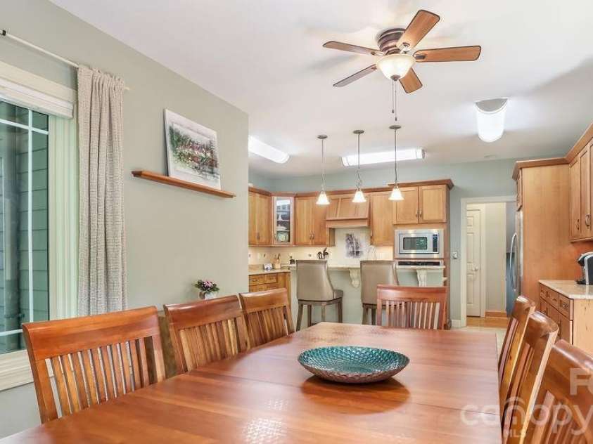 301 Gateway Drive, Hendersonville, NC 28739.  MLS# CAR4373962, YatesRealty ID 19050. Dining area looking towards the kitchen.
