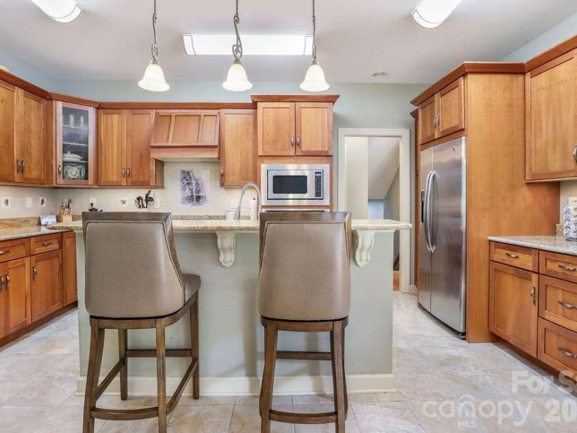 301 Gateway Drive, Hendersonville, NC 28739.  MLS# CAR4373962, YatesRealty ID 19050. Entertaining is easy with this spacious gourmet kitchen.