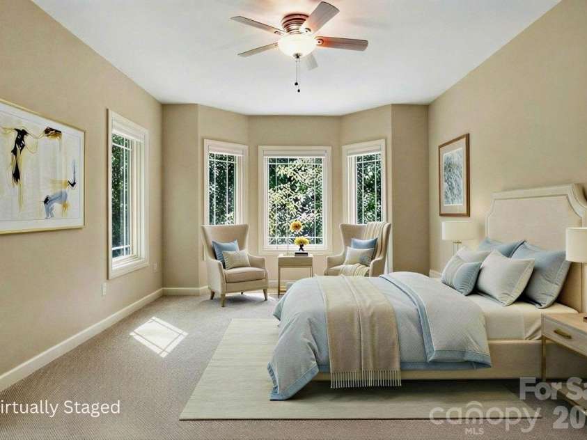 301 Gateway Drive, Hendersonville, NC 28739.  MLS# CAR4373962, YatesRealty ID 19050. Primary suite looking towards the bay window sitting area. Virtually staged.