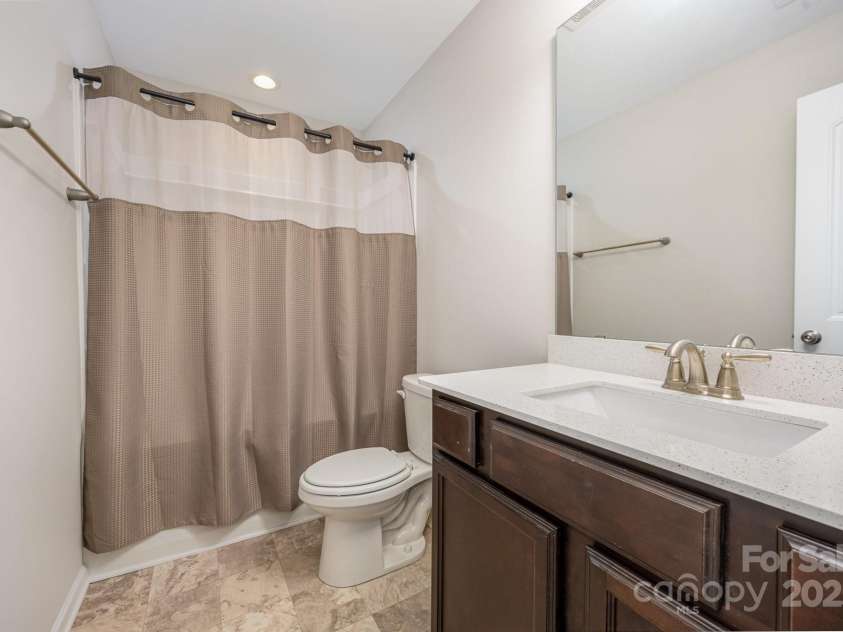 122 Red Plum Lane, Jamestown, NC 27282.  MLS# CAR4222988, YatesRealty ID 19051. Hall bath on upper level