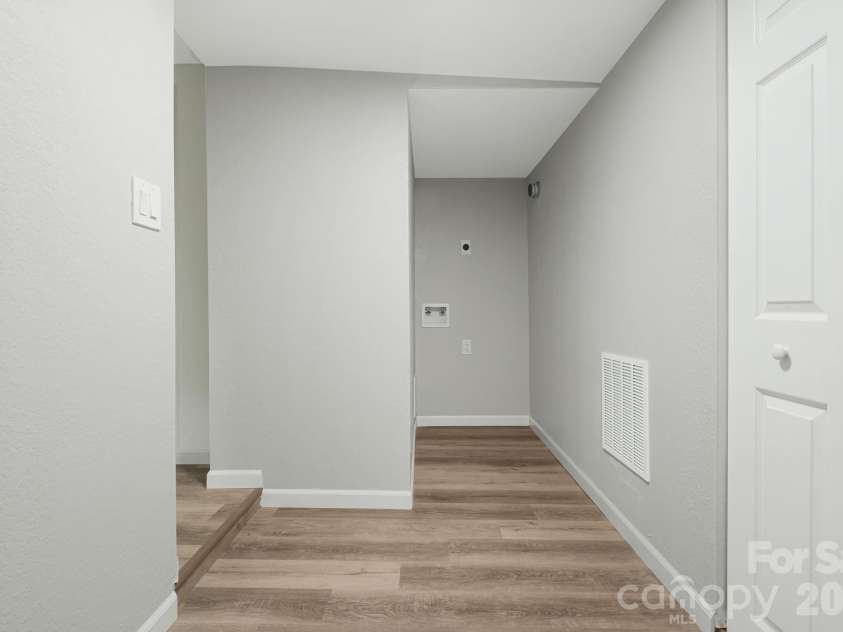 95 Grassy View Road, Candler, NC 28715.  MLS# CAR4283278, YatesRealty ID 19056. Laundry area designed for stackable washer and dryer!