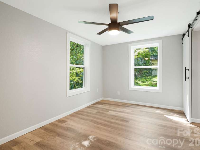 95 Grassy View Road, Candler, NC 28715.  MLS# CAR4283278, YatesRealty ID 19056. Primary room on the main level