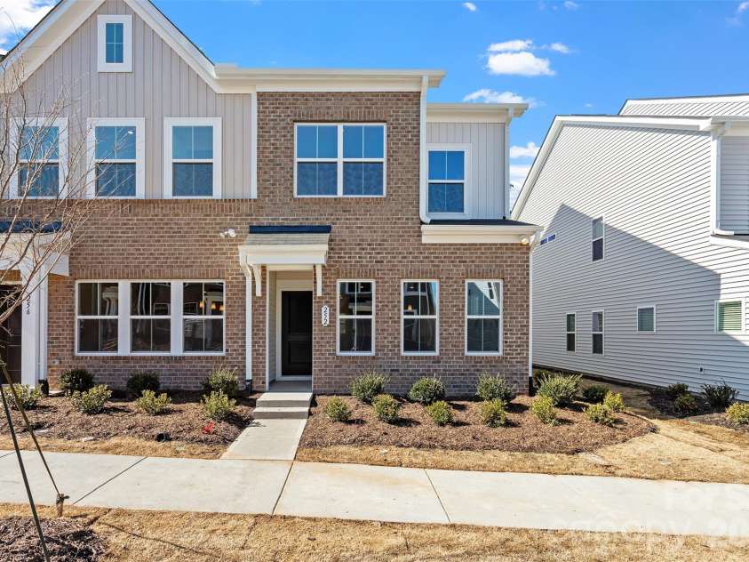 5869 Tuckaseegee Road, Charlotte, NC 28208.  MLS# CAR4342458, YatesRealty ID 1906. Unit 1 features an end-unit Cannalily C floorplan. Please note that these are stock photos only and actual exterior will be Vinyl. 