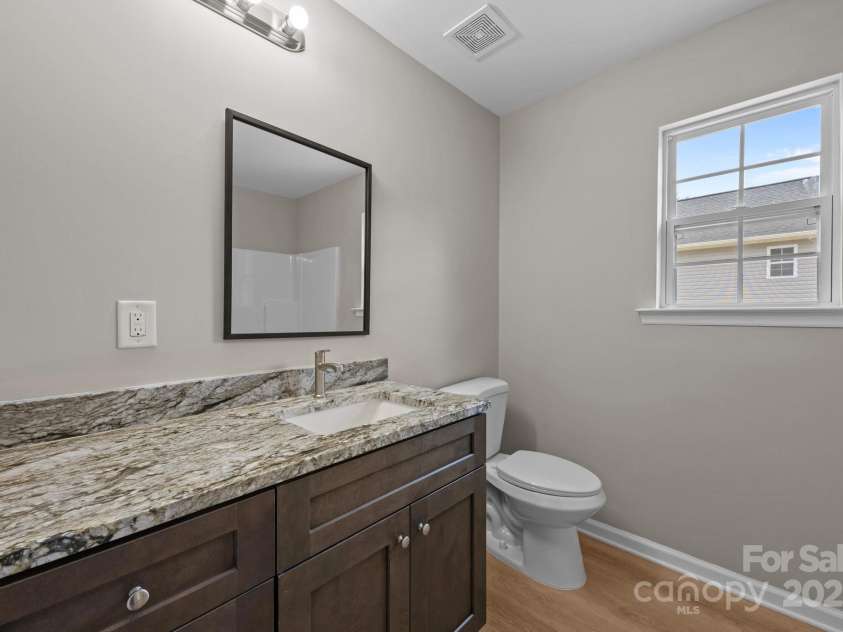 130 Aurora Boulevard, Matthews, NC 28105.  MLS# CAR4268869, YatesRealty ID 19063. Jack & Jill Bathroom
