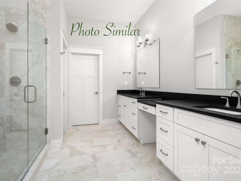 58 Chimney Chase Trail, Hendersonville, NC 28739.  MLS# CAR4239599, YatesRealty ID 1907. Owner's Ensuite Bath