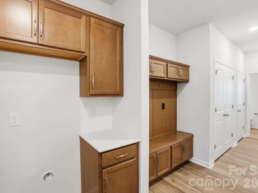 5865 Tuckaseegee Road, Charlotte, NC 28208.  MLS# CAR4401600, YatesRealty ID 1907. Fridge area & Mudroom