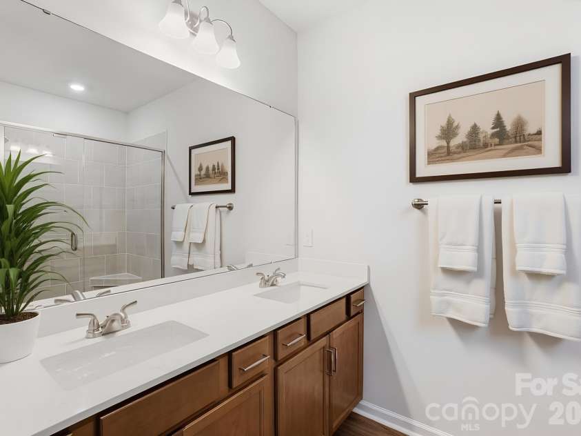 5865 Tuckaseegee Road, Charlotte, NC 28208.  MLS# CAR4401600, YatesRealty ID 1907. Primary bathroom virtually staged
