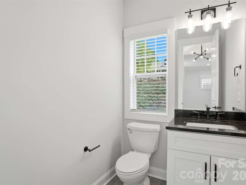 302 Lima Avenue, Charlotte, NC 28208.  MLS# CAR4363412, YatesRealty ID 19070. Half bathroom