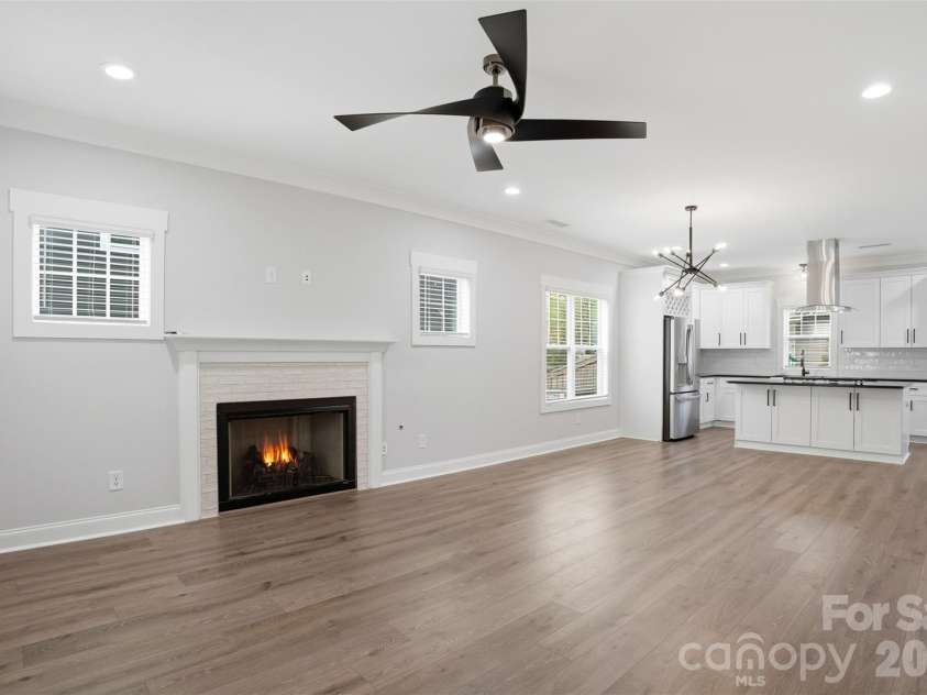 302 Lima Avenue, Charlotte, NC 28208.  MLS# CAR4363412, YatesRealty ID 19070. Open floorplan with upper and lower windows and upgraded lighting