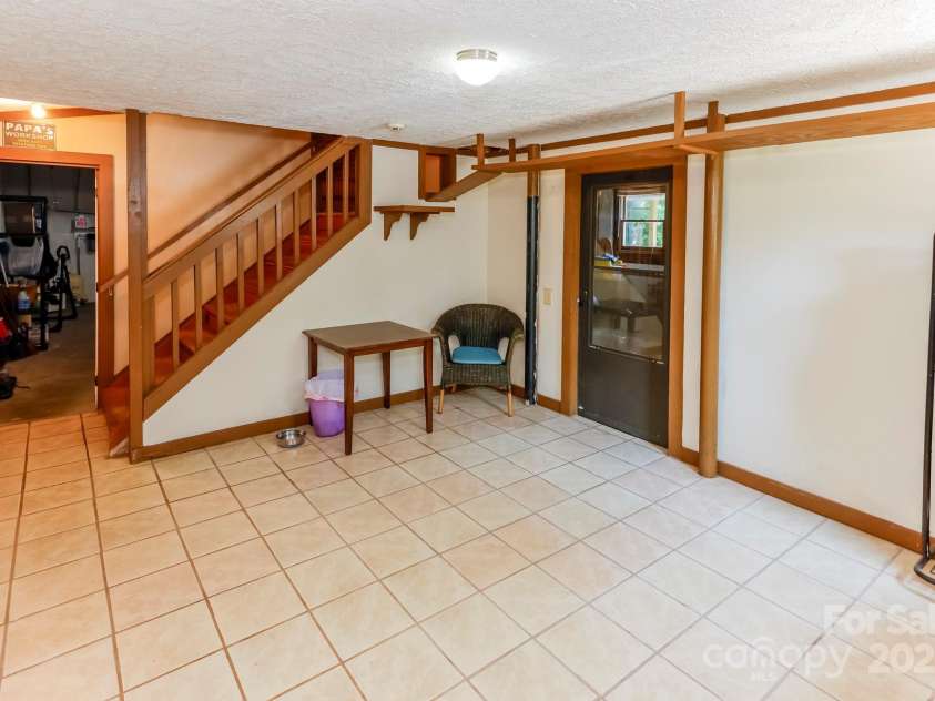 189 Greenhill Ridge Drive, Rutherfordton, NC 28139.  MLS# CAR4270238, YatesRealty ID 19071. Entry/mud area in basement. Basement accessible from outside and main level