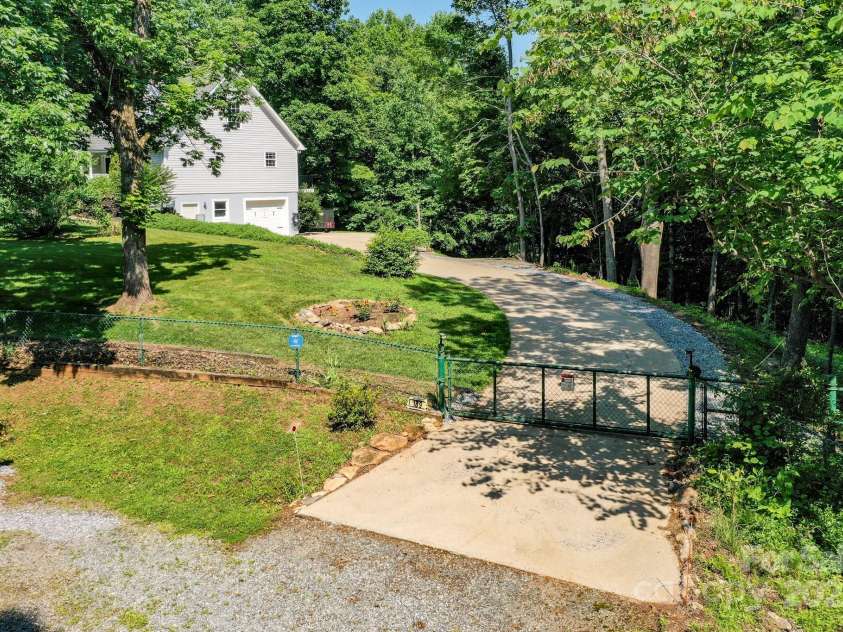 189 Greenhill Ridge Drive, Rutherfordton, NC 28139.  MLS# CAR4270238, YatesRealty ID 19071. Home has an electronic gate which opens with a gate code reachable from your vehicle