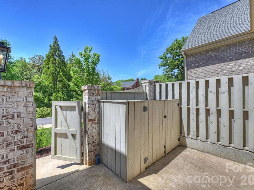 3119 Knowlton Lane, Charlotte, NC 28205.  MLS# CAR4374422, YatesRealty ID 19073. Garbage storage and back entry