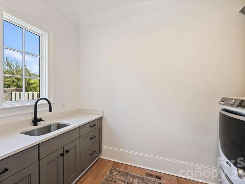 3119 Knowlton Lane, Charlotte, NC 28205.  MLS# CAR4374422, YatesRealty ID 19073. Laundry room/main floor with sink