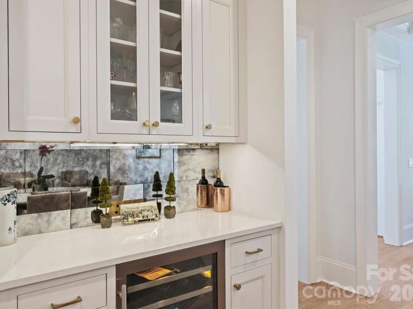 3119 Knowlton Lane, Charlotte, NC 28205.  MLS# CAR4374422, YatesRealty ID 19073. Wet bar with wine refrigerator
