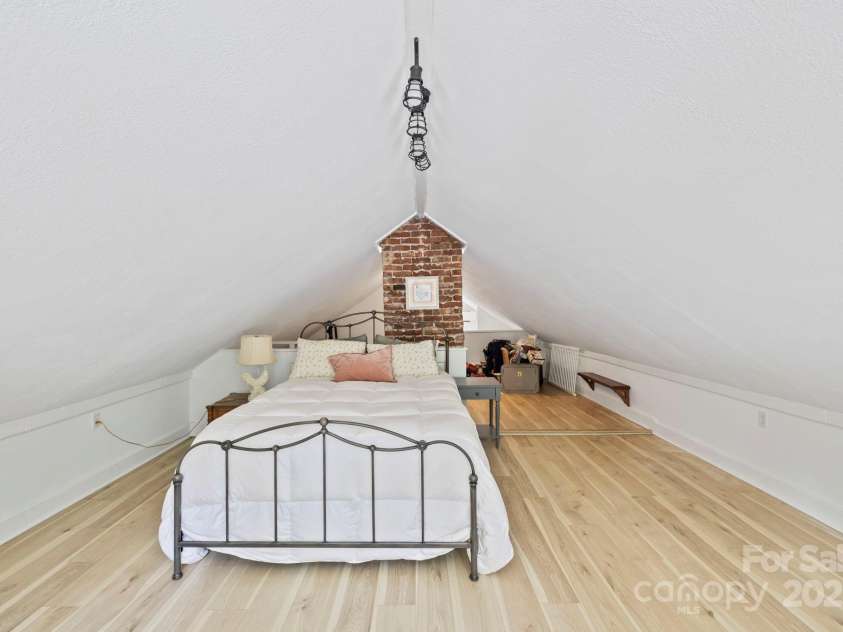 51 HOMEFIRE COVE Cove, Leicester, NC 28748.  MLS# CAR4269158, YatesRealty ID 19075. Loft bedroom