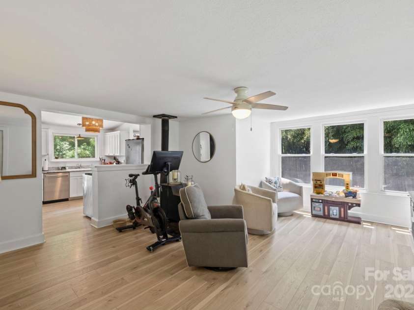 51 HOMEFIRE COVE Cove, Leicester, NC 28748.  MLS# CAR4269158, YatesRealty ID 19075. Open living to kitchen - with all new flooring! 