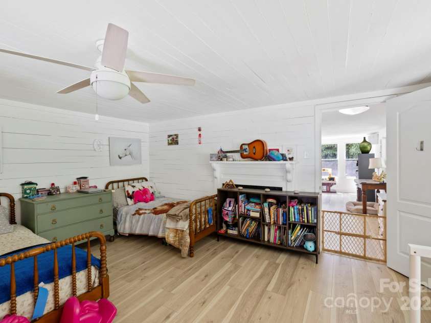 51 HOMEFIRE COVE Cove, Leicester, NC 28748.  MLS# CAR4269158, YatesRealty ID 19075. Spacious front bedroom just off living area