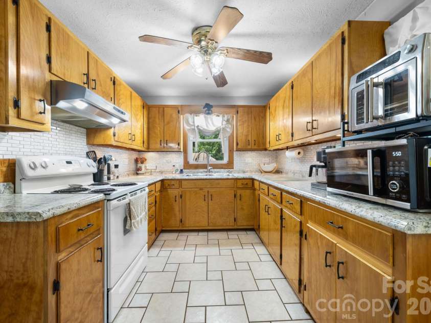 2582 Startown Road, Newton, NC 28658.  MLS# CAR4378748, YatesRealty ID 19081. Beautiful cabinets hand-made by owner.