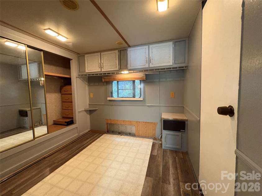 333 Mount View Lane, New London, NC 28127.  MLS# CAR4269938, YatesRealty ID 19081. Camper side BRM w/ built in storage (Camper bed has been removed)