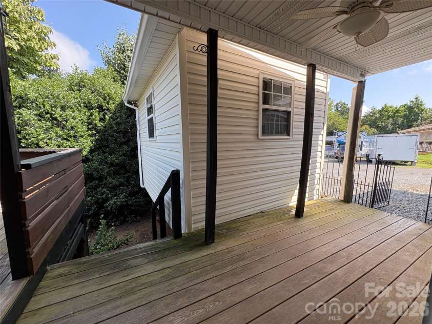 333 Mount View Lane, New London, NC 28127.  MLS# CAR4269938, YatesRealty ID 19081. Covered porch/deck w/ access to below storage (under deck and shed)