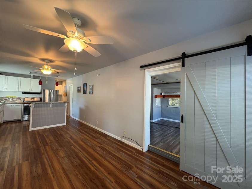 333 Mount View Lane, New London, NC 28127.  MLS# CAR4269938, YatesRealty ID 19081. Sliding barn door into spacious bedroom