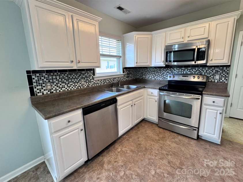 24 Torrington Avenue, Fletcher, NC 28732.  MLS# CAR4269728, YatesRealty ID 19084. 