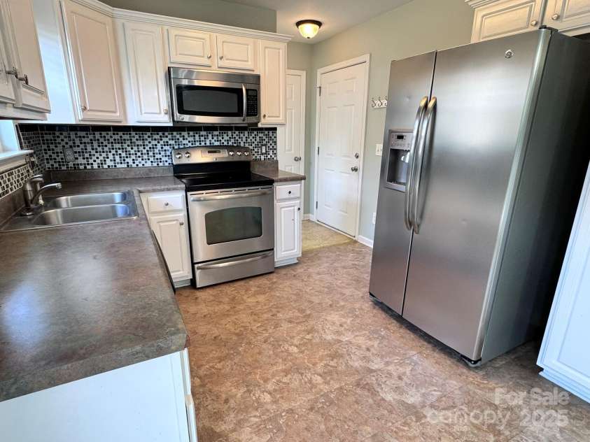 24 Torrington Avenue, Fletcher, NC 28732.  MLS# CAR4269728, YatesRealty ID 19084. 