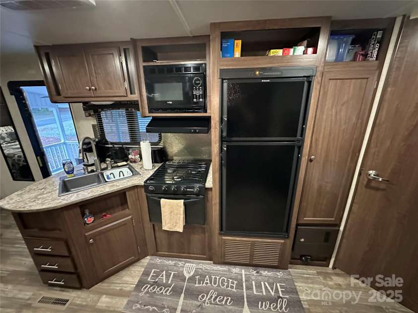 107 Pine Street, New London, NC 28127.  MLS# CAR4266305, YatesRealty ID 19086. 