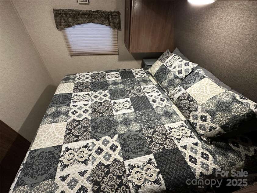 107 Pine Street, New London, NC 28127.  MLS# CAR4266305, YatesRealty ID 19086. 