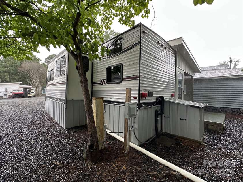 107 Pine Street, New London, NC 28127.  MLS# CAR4266305, YatesRealty ID 19086. 