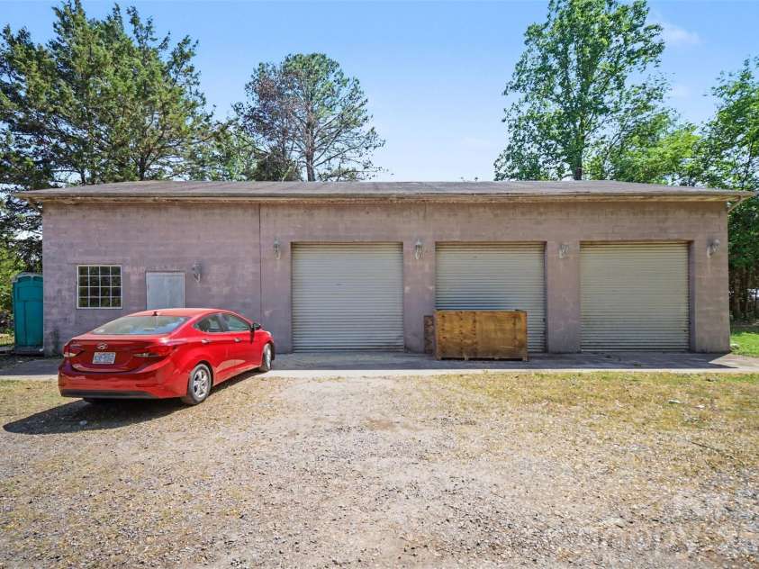 5226 Old Plank Road, Iron Station, NC 28080.  MLS# CAR4365700, YatesRealty ID 19087. 2,400 sq ft detached garage offers endless possibilities