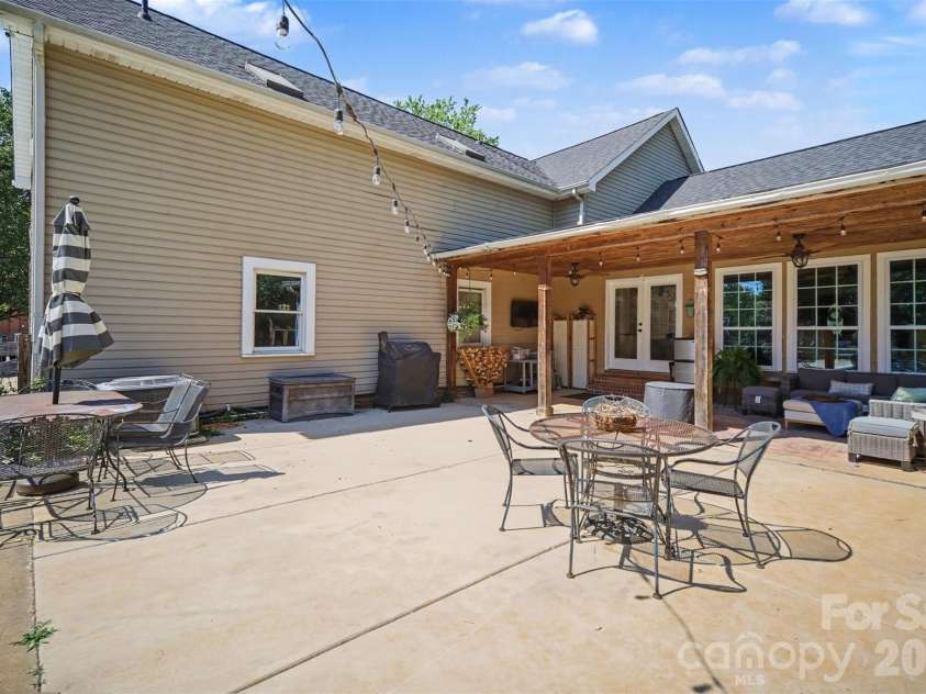 5226 Old Plank Road, Iron Station, NC 28080.  MLS# CAR4365700, YatesRealty ID 19087. Covered porch plus additional concrete patios