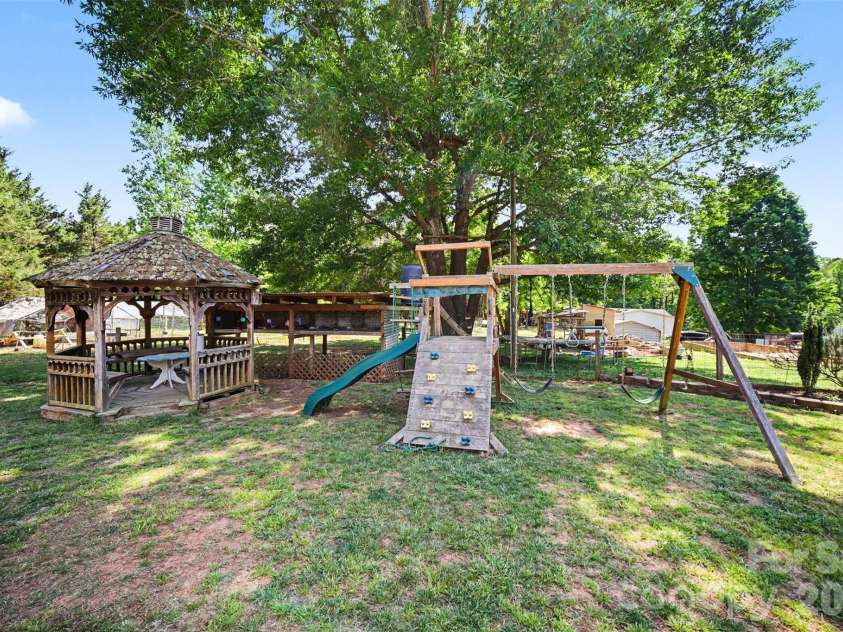 5226 Old Plank Road, Iron Station, NC 28080.  MLS# CAR4365700, YatesRealty ID 19087. Enjoy gazebo and children's playlet