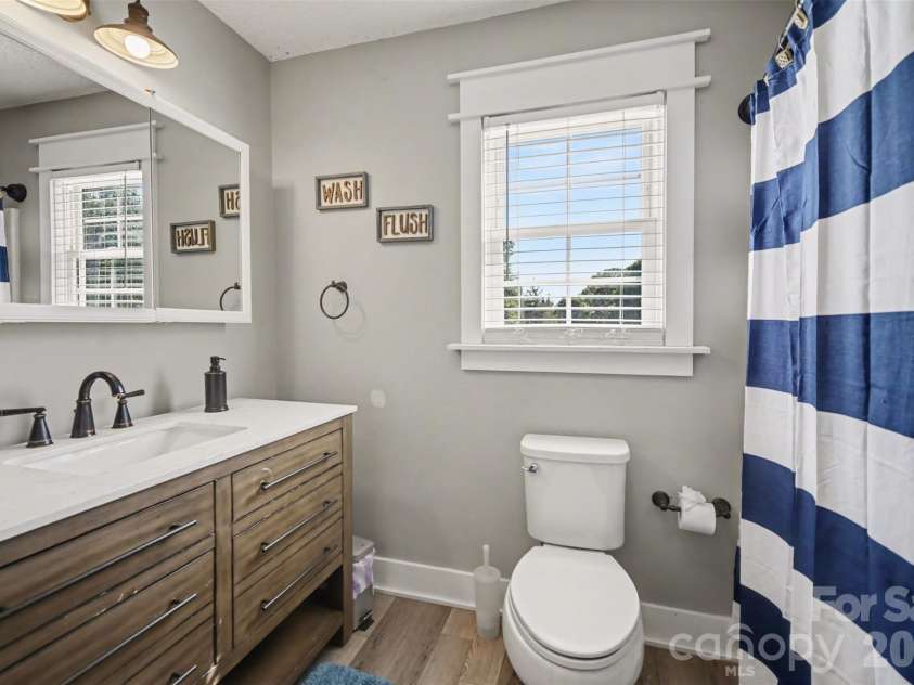 5226 Old Plank Road, Iron Station, NC 28080.  MLS# CAR4365700, YatesRealty ID 19087. Full upstairs bathroom