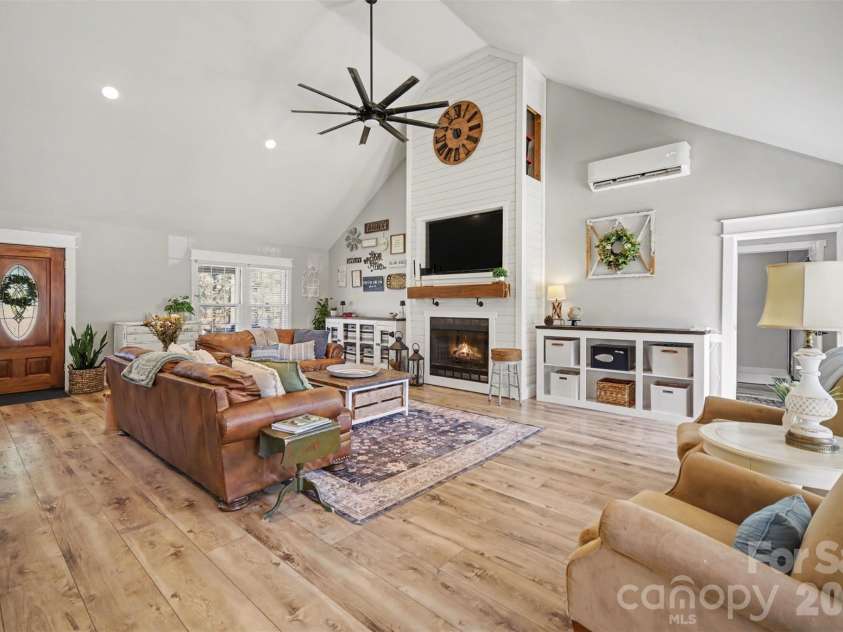 5226 Old Plank Road, Iron Station, NC 28080.  MLS# CAR4365700, YatesRealty ID 19087. Great room with fireplace