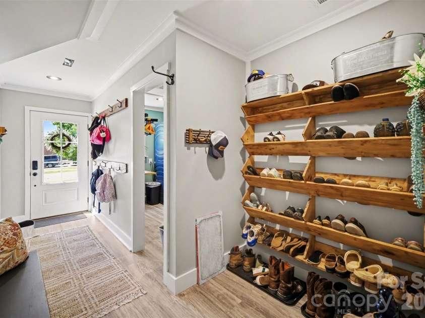 5226 Old Plank Road, Iron Station, NC 28080.  MLS# CAR4365700, YatesRealty ID 19087. Mudroom dropzone w/built-in shoe storage