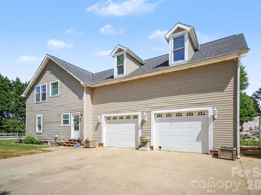 5226 Old Plank Road, Iron Station, NC 28080.  MLS# CAR4365700, YatesRealty ID 19087. Oversized attached garage is over 750 sq ft
