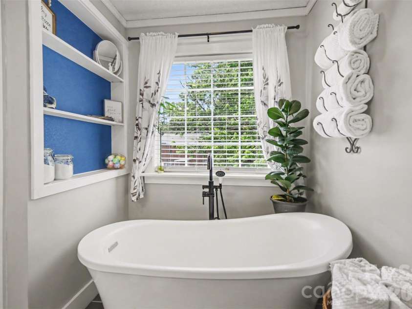 5226 Old Plank Road, Iron Station, NC 28080.  MLS# CAR4365700, YatesRealty ID 19087. Slipper tub in primary bath