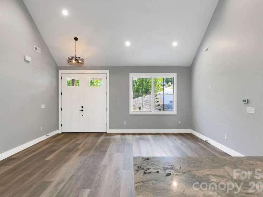 404 High Ridge Drive, Mills River, NC 28759.  MLS# CAR4371927, YatesRealty ID 19089. Front Door From Kitchen